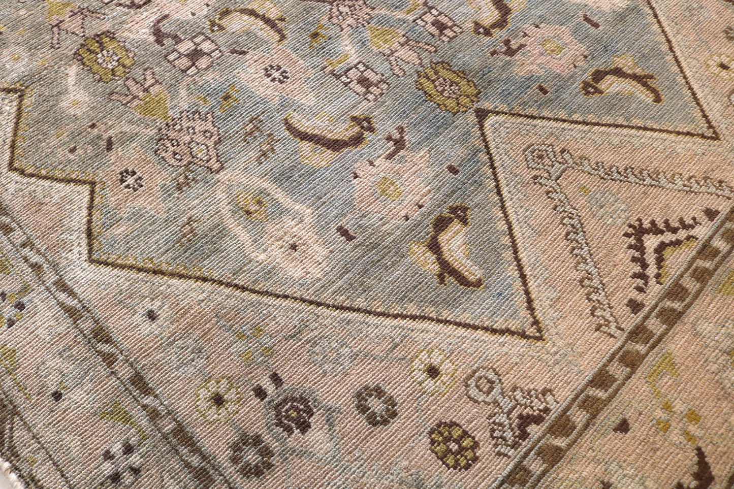 Malayer with muted colours and light blue centre