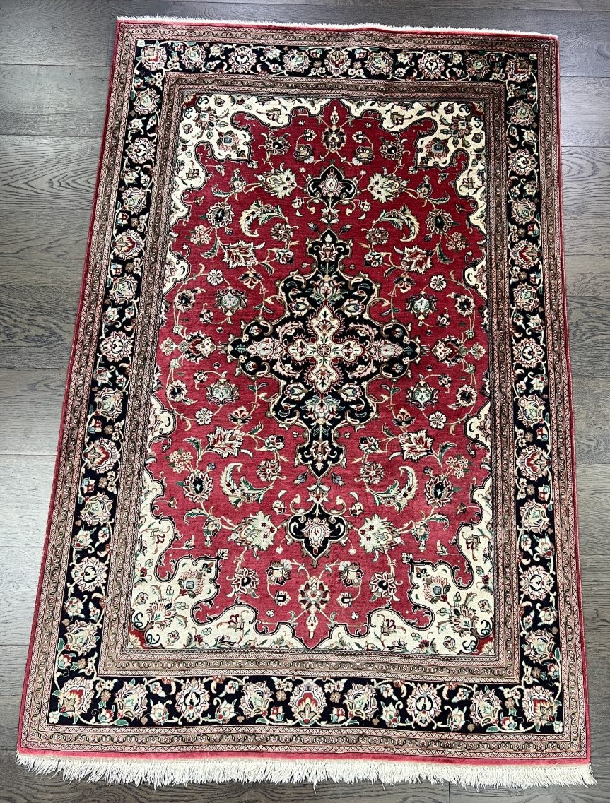 Stunning vintage decorative Isfahan silk rug.